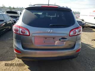 2012 Hyundai Santa Fe Limited с VIN 5XYZKDAG5CG110772, выставлен на аукционе Copart как лот 71411764 с пробегом 218 606 миль миль и Списание • Salvage title. История ставок и продаж доступна на DreamBid. Изображение 6.