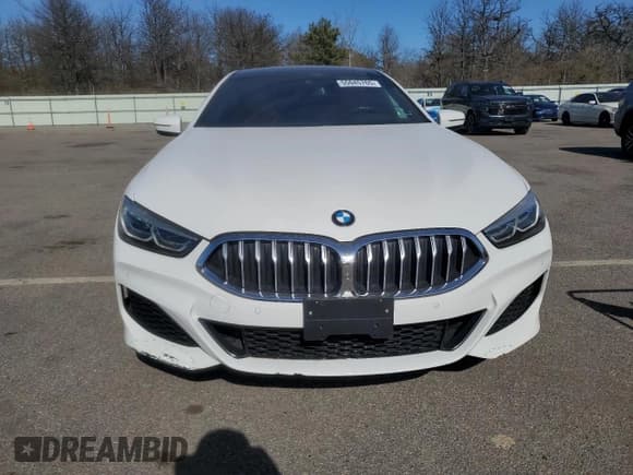 ✅ 2022 BMW 8 Series 840i • VIN: WBAGV2C0XNCG97478 • Лот: 55045765. Опубликован ранее на Copart с пробегом 31 268 миль. Бесплатный доступ к архиву аукционных продаж из США и подробный отчёт об истории автомобиля на DreamBid. Изображение 5.