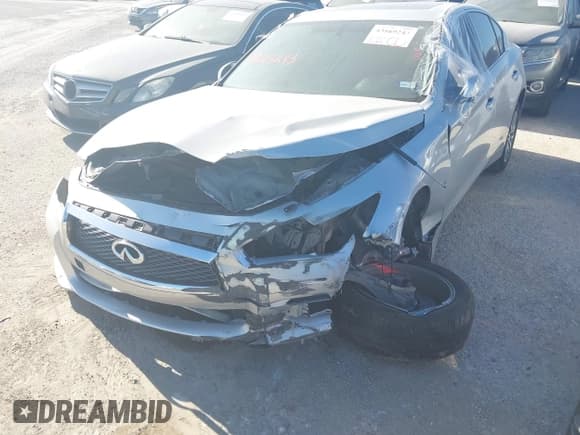 ✅ 2016 Infiniti Q50 Premium • VIN: JN1CV7AP0GM202801 • Lot: 43169243. Wystawiony na IAAI z przebiegiem 149 851 mil. Bezpłatny archiwum sprzedaży aukcyjnych z USA i szczegółowy raport historii pojazdu na DreamBid. Zdjęcie 6.