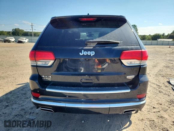 ✅ 2018 Jeep Grand Cherokee Summit • VIN: 1C4RJFJG4JC506708 • Lot: 82303345. Listed on Copart with 104,788 mi. Free auction sales archive from the USA and detailed vehicle history report at DreamBid. Image 6.
