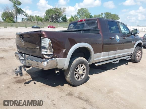✅ 2015 Ram 2500 Laramie • VIN: 3C6UR5NL0FG557882 • Лот: 42932287. Опубликован ранее на IAAI с пробегом 359 946 миль. Бесплатный доступ к архиву аукционных продаж из США и подробный отчёт об истории автомобиля на DreamBid. Изображение 4.