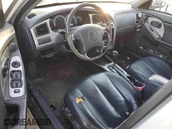 2003 Hyundai Elantra GLS z VIN KMHDN45D73U633397, wystawiony jako Copart lot #79562704 z przebiegiem 127 366 mil mil oraz Czysty tytuł • Clean title. Historia ofert i sprzedaży dostępna na DreamBid. Obrazek 8.