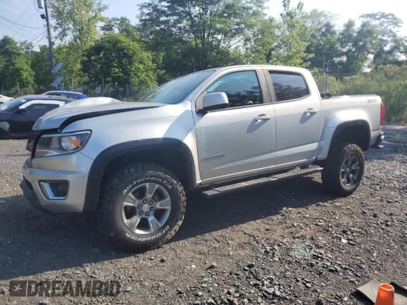 ✅ 2018 Chevrolet Colorado 4WD Z71 • VIN: 1GCGTDEN1J1170087 • Лот: 68008125. Опубликован ранее на Copart с пробегом 75 895 миль. Бесплатный доступ к архиву аукционных продаж из США и подробный отчёт об истории автомобиля на DreamBid. Изображение 1.