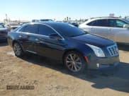 ✅ 2013 Cadillac XTS Luxury • VIN: 2G61P5S30D9149205 • Lot: 43905033. Wystawiony na IAAI z przebiegiem 159 114 mil. Bezpłatny archiwum sprzedaży aukcyjnych z USA i szczegółowy raport historii pojazdu na DreamBid. Zdjęcie 1.