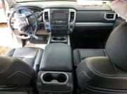 ✅ 2018 Nissan Titan Platinum Reserve • VIN: 1N6BA1F49JN521225 • Lot: 69831004. Listed on Copart with 92,536 mi. Free auction sales archive from the USA and detailed vehicle history report at DreamBid. Image 8.