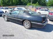 ✅ 2002 Cadillac Eldorado ESC • VIN: 1G6EL12Y52B105388 • Lot: 42423318. Listed on IAAI with 143,045 mi. Free auction sales archive from the USA and detailed vehicle history report at DreamBid. Image 3.