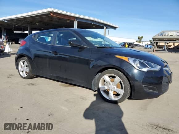 2012 Hyundai Veloster w/Red Int z VIN KMHTC6AD2CU065143, wystawiony jako Copart lot #87262524 z przebiegiem 111 448 mil mil oraz Czysty tytuł • Clean title. Historia ofert i sprzedaży dostępna na DreamBid. Obrazek 4.