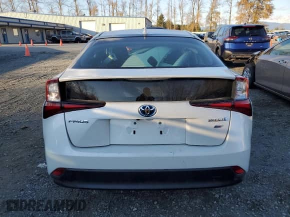 2020 Toyota Prius L Eco с VIN JTDKARFUXL3119679, выставлен на аукционе Copart как лот 77231514 с пробегом 69 861 миль миль и Списание • Salvage title. История ставок и продаж доступна на DreamBid. Изображение 6.