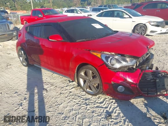 ✅ 2013 Hyundai Veloster Turbo • VIN: KMHTC6AE1DU174106 • Lot: 43497748. Listed on IAAI with 117,365 mi. Free auction sales archive from the USA and detailed vehicle history report at DreamBid. Image 1.