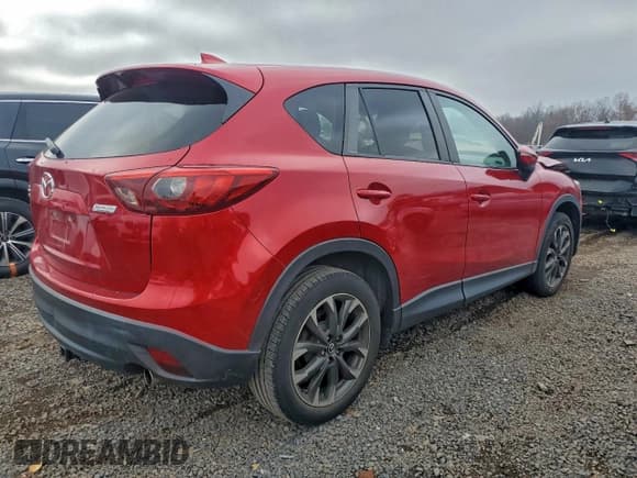 ✅ 2016 Mazda CX-5 Grand Touring • VIN: JM3KE4DY7G0814746 • Lot: 93676175. Wystawiony na Copart z przebiegiem 65 711 mil. Bezpłatny archiwum sprzedaży aukcyjnych z USA i szczegółowy raport historii pojazdu na DreamBid. Zdjęcie 3.