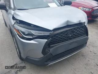 ✅ 2022 Toyota Corolla Cross L • VIN: 7MUAAAAG0NV003686 • Lot: 43387640. Listed on IAAI with 48,701 mi. Free auction sales archive from the USA and detailed vehicle history report at DreamBid. Image 6.