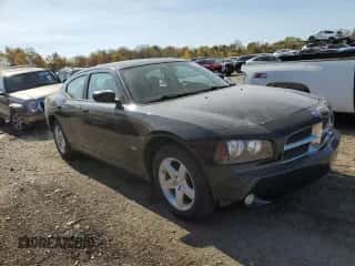 2009 Dodge Charger SXT with VIN 2B3KA33V49H573525, listed as a Copart auction lot 76044134 with 98,420 mi miles and Clean title. Bid and sale history available at DreamBid. Image 4.
