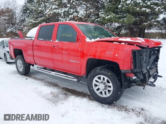 ✅ 2017 Chevrolet Silverado 2500HD LT • VIN: 1GC1KVEG1HF104295 • Lot: 41276100. Listed on IAAI with 65,635 mi. Free auction sales archive from the USA and detailed vehicle history report at DreamBid. Image 1.