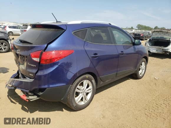 2013 Hyundai Tucson GLS z VIN KM8JUCACXDU639919, wystawiony jako Copart lot #65448984 z przebiegiem Nie podano mil oraz Szkoda całkowita • Salvage title. Historia ofert i sprzedaży dostępna na DreamBid. Obrazek 3.