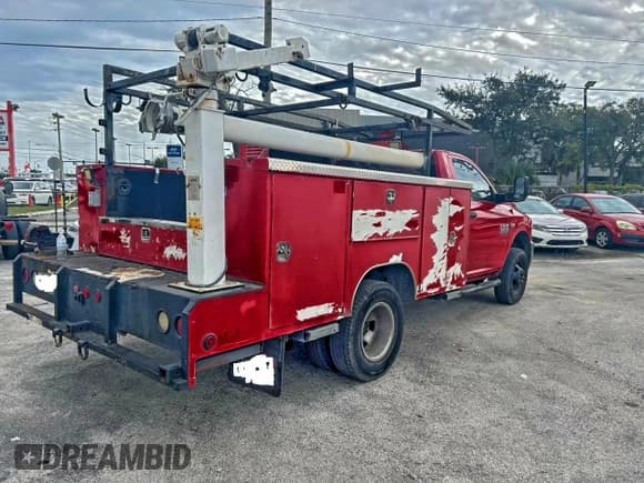 ✅ 2016 Ram 3500 • VIN: 3C7WRSAJ0GG185453 • Lot: 94827845. Listed on Copart with 213,947 mi. Free auction sales archive from the USA and detailed vehicle history report at DreamBid. Image 4.