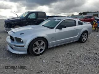 ✅ 2006 Ford Mustang GT Deluxe • VIN: 1ZVFT82HX65216207 • Lot: 82680985. Listed on Copart with 121,929 mi. Free auction sales archive from the USA and detailed vehicle history report at DreamBid. Image 1.