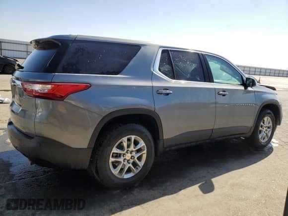 2020 Chevrolet Traverse LS z VIN 1GNERLKW3LJ273020, wystawiony jako Copart lot #77422724 z przebiegiem 156 784 mil mil oraz Czysty tytuł • Clean title. Historia ofert i sprzedaży dostępna na DreamBid. Obrazek 3.