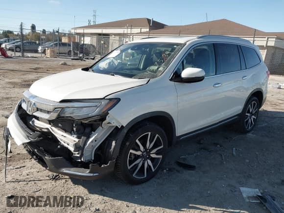 ✅ 2019 Honda Pilot Touring 8-Passenger • VIN: 5FNYF6H90KB066110 • Лот: 43575989. Опубликован ранее на IAAI с пробегом 101 247 миль. Бесплатный доступ к архиву аукционных продаж из США и подробный отчёт об истории автомобиля на DreamBid. Изображение 2.