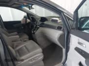 ✅ 2012 Honda Odyssey Touring • VIN: 5FNRL5H92CB106325 • Lot: 43287538. Listed on IAAI with 206,962 mi. Free auction sales archive from the USA and detailed vehicle history report at DreamBid. Image 5.