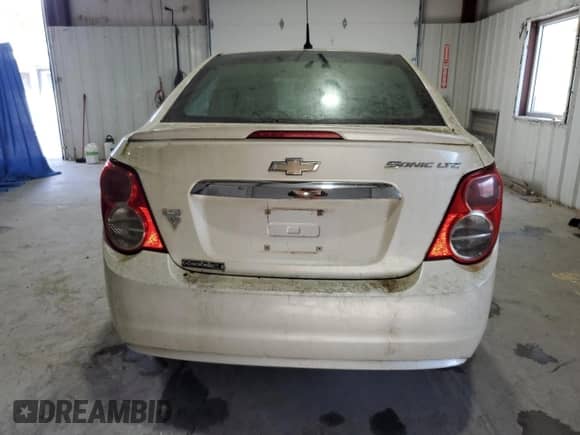 ✅ 2013 Chevrolet Sonic LTZ • VIN: 1G1JE5SHXD4244560 • Lot: 91515575. Listed on Copart with 175,902 mi miles. Access the free auction sales archive from the USA and view a detailed vehicle history report at DreamBid. Image 6.