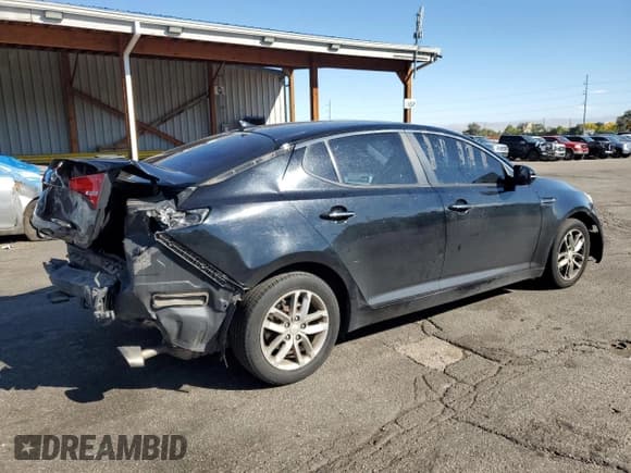 ✅ 2013 Kia Optima LX • VIN: 5XXGM4A77DG220715 • Lot: 86548555. Listed on Copart with 141,787 mi. Free auction sales archive from the USA and detailed vehicle history report at DreamBid. Image 3.