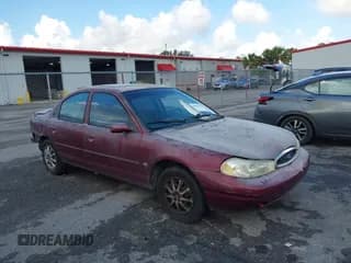 ✅ 1999 Ford Contour SE • VIN: 1FAFP6635XK169090 • Лот: 42198696. Опубликован ранее на IAAI с пробегом 114 933 миль. Бесплатный доступ к архиву аукционных продаж из США и подробный отчёт об истории автомобиля на DreamBid. Изображение 1.