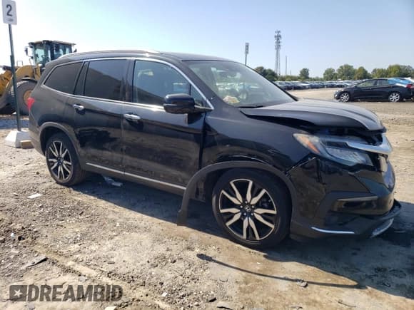 ✅ 2020 Honda Pilot Touring 7-Passenger • VIN: 5FNYF5H65LB009516 • Lot: 81001735. Listed on Copart with 66,757 mi. Free auction sales archive from the USA and detailed vehicle history report at DreamBid. Image 4.