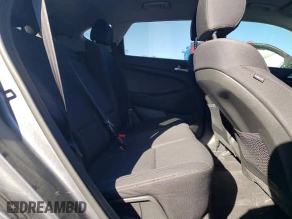 2019 Hyundai Tucson SE z VIN KM8J23A44KU910291, wystawiony jako Copart lot #86820405 z przebiegiem 61 875 mil mil oraz Szkoda całkowita • Salvage title. Historia ofert i sprzedaży dostępna na DreamBid. Obrazek 10.