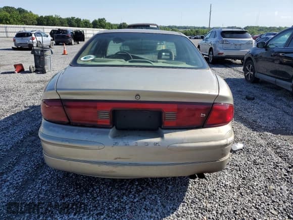 ✅ 1999 Buick Regal LS • VIN: 2G4WB52K4X1458845 • Lot: 55254814. Wystawiony na Copart z przebiegiem 200 000 mil. Bezpłatny archiwum sprzedaży aukcyjnych z USA i szczegółowy raport historii pojazdu na DreamBid. Zdjęcie 6.