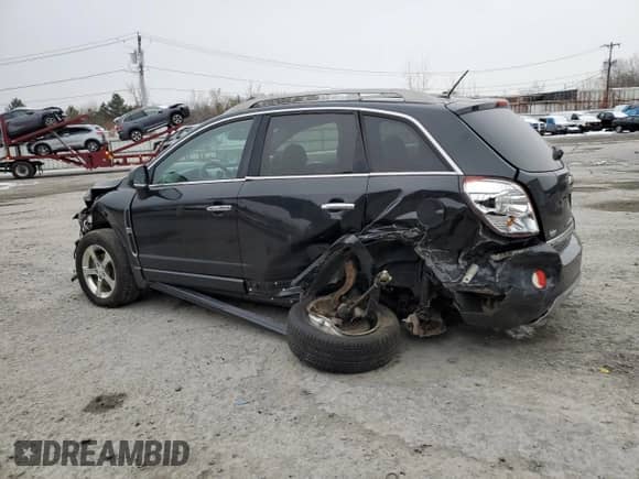 2012 Chevrolet Captiva Sport LTZ z VIN 3GNFL4E5XCS624082, wystawiony jako Copart lot #83013754 z przebiegiem 107 037 mil mil oraz Szkoda całkowita • Salvage title. Historia ofert i sprzedaży dostępna na DreamBid. Obrazek 2.