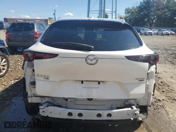 ✅ 2022 Mazda CX-30 Premium Plus • VIN: 3MVDMBEY2NM412438 • Лот: 80457835. Опубликован ранее на Copart с пробегом 46 684 миль. Бесплатный доступ к архиву аукционных продаж из США и подробный отчёт об истории автомобиля на DreamBid. Изображение 6.