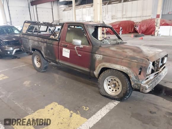 ✅ 1988 Ford Ranger • VIN: 1FTCR11T5JUC90621 • Lot: 42784390. Listed on IAAI with Not provided. Free auction sales archive from the USA and detailed vehicle history report at DreamBid. Image 1.