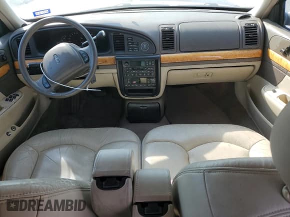 ✅ 2002 Lincoln Continental • VIN: 1LNHM97V32Y647800 • Lot: 75240874. Listed on Copart with 71,689 mi. Free auction sales archive from the USA and detailed vehicle history report at DreamBid. Image 8.