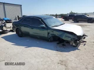 ✅ 1999 Mazda 626 ES • VIN: 1YVGF22C1X5896686 • Lot: 72012584. Wystawiony na Copart z przebiegiem 123 672 mil. Bezpłatny archiwum sprzedaży aukcyjnych z USA i szczegółowy raport historii pojazdu na DreamBid. Zdjęcie 4.