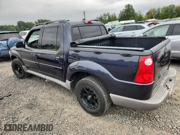 ✅ 2001 Ford Explorer Sport Trac • VIN: 1FMZU77E11UA42379 • Lot: 80549825. Listed on Copart with 221,801 mi. Free auction sales archive from the USA and detailed vehicle history report at DreamBid. Image 2.