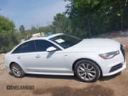 ✅ 2018 Audi A6 Premium • VIN: WAUC8AFC0JN045308 • Lot: 42881899. Wystawiony na IAAI z przebiegiem 72 077 mil. Bezpłatny archiwum sprzedaży aukcyjnych z USA i szczegółowy raport historii pojazdu na DreamBid. Zdjęcie 13.