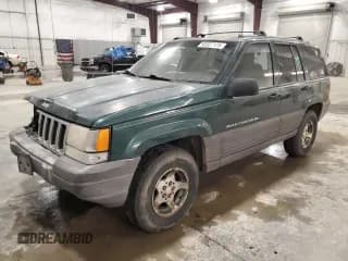 ✅ 1996 Jeep Grand Cherokee Laredo • VIN: 1J4GZ58S9TC198257 • Lot: 93327175. Listed on Copart with 169,183 mi. Free auction sales archive from the USA and detailed vehicle history report at DreamBid. Image 1.