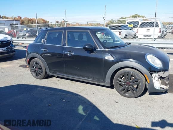 ✅ 2015 MINI Hardtop 4 Door • VIN: WMWXS5C59FT830719 • Lot: 43610367. Listed on IAAI with 90,169 mi. Free auction sales archive from the USA and detailed vehicle history report at DreamBid. Image 14.