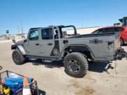 ✅ 2023 Jeep Gladiator Mojave • VIN: 1C6JJTEGXPL524832 • Lot: 85205905. Listed on Copart with 14,561 mi. Free auction sales archive from the USA and detailed vehicle history report at DreamBid. Image 2.