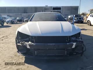 ✅ 2021 Audi RS 7 • VIN: WUAPCBF2XMN904458 • Lot: 80066123. Wystawiony na Copart z przebiegiem 34 772 mil. Bezpłatny archiwum sprzedaży aukcyjnych z USA i szczegółowy raport historii pojazdu na DreamBid. Zdjęcie 5.