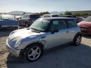 2003 MINI Hardtop with VIN WMWRC334X3TE14601, listed as a Copart auction lot 67837005 with 115,992 mi miles and Salvage title. Bid and sale history available at DreamBid. Image 1.