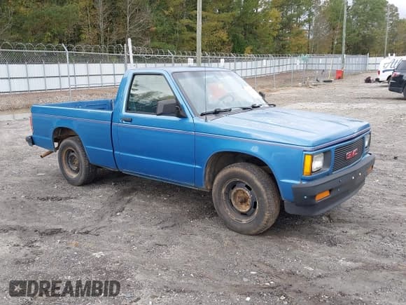 ✅ 1991 GMC Sonoma • VIN: 1GTCS14Z1M0521918 • Lot: 43582470. Listed on IAAI with 142,351 mi. Free auction sales archive from the USA and detailed vehicle history report at DreamBid. Image 1.