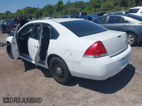 ✅ 2013 Chevrolet Impala Police • VIN: 2G1WD5E35D1221501 • Lot: 43269727. Listed on IAAI with 95,859 mi. Free auction sales archive from the USA and detailed vehicle history report at DreamBid. Image 3.