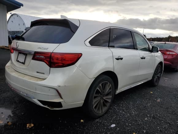 ✅ 2019 Acura MDX Hybrid Sport • VIN: 5J8YD7H56KL000975 • Лот: 89923675. Опубликован ранее на Copart с пробегом 162 602 миль. Бесплатный доступ к архиву аукционных продаж из США и подробный отчёт об истории автомобиля на DreamBid. Изображение 3.