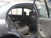 ✅ 2003 Kia Rio • VIN: KNADC125536274171 • Lot: 41986369. Wystawiony na IAAI z przebiegiem 59 837 mil. Bezpłatny archiwum sprzedaży aukcyjnych z USA i szczegółowy raport historii pojazdu na DreamBid. Zdjęcie 8.