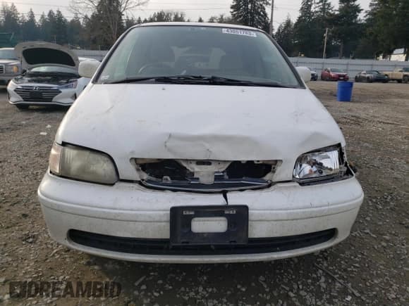 ✅ 1998 Honda Odyssey • VIN: RA31038664 • Lot: 43051785. Listed on Copart with 106,084 mi. Free auction sales archive from the USA and detailed vehicle history report at DreamBid. Image 5.