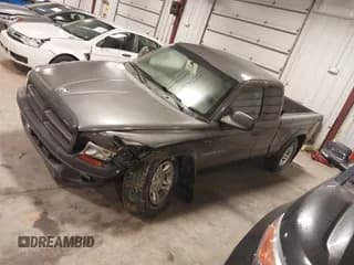 ✅ 2002 Dodge Dakota Sport • VIN: 1B7GG32N32S509012 • Lot: 41306952. Wystawiony na IAAI z przebiegiem 159 108 mil. Bezpłatny archiwum sprzedaży aukcyjnych z USA i szczegółowy raport historii pojazdu na DreamBid. Zdjęcie 2.