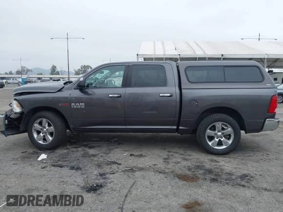 2016 Ram 1500 Big Horn with VIN 1C6RR6LM3GS233861, listed as a IAAI auction lot 41890394 with 61,637 mi miles and . Bid and sale history available at DreamBid. Image 15.