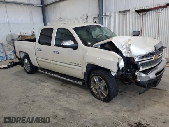 2011 Chevrolet Silverado 1500 LT with VIN 3GCPKSE37BG325413, listed as a Copart auction lot 63520545 with 264,592 mi miles and Salvage title. Bid and sale history available at DreamBid. Image 4.