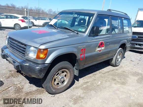 ✅ 1993 Mitsubishi Montero • VIN: JA4MR41H4PJ007602 • Lot: 41832401. Wystawiony na IAAI z przebiegiem 191 549 mil. Bezpłatny archiwum sprzedaży aukcyjnych z USA i szczegółowy raport historii pojazdu na DreamBid. Zdjęcie 2.